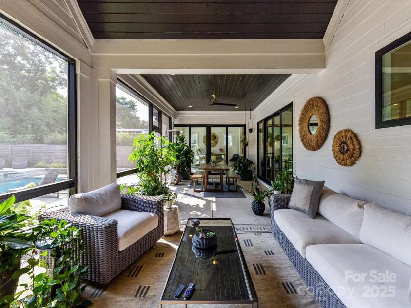 615 Melbourne Court, Charlotte, NC 28209.  MLS# CAR4279711, YatesRealty ID 25487. Screened Porch