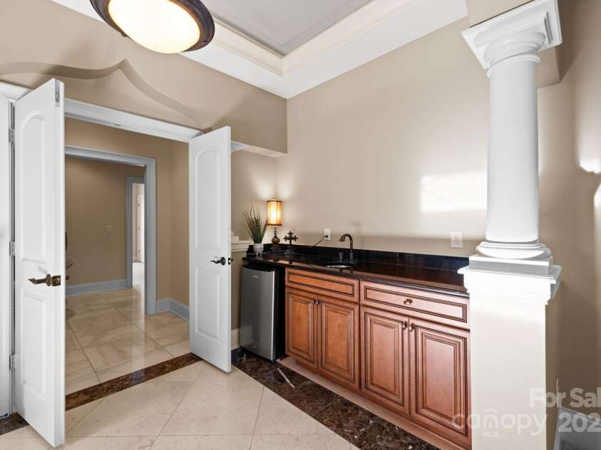 237 Wilson Lake Road, Mooresville, NC 28117.  MLS# CAR4218065, YatesRealty ID 2549. Coffee Bar in Primary Suite