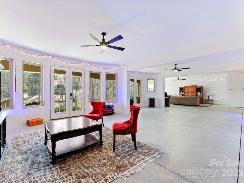 237 Wilson Lake Road, Mooresville, NC 28117.  MLS# CAR4218065, YatesRealty ID 2549. Lower level walk out to lake