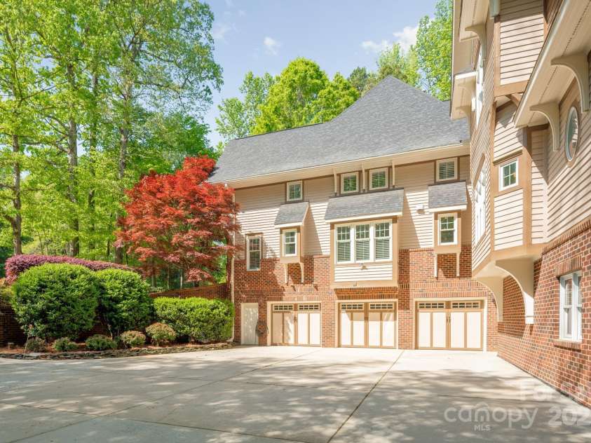 3201 Oak Brook Drive, Waxhaw, NC 28173.  MLS# CAR4247605, YatesRealty ID 25490. Great Courtyard Area with an oversized 3 car Garage (plus additional garage)