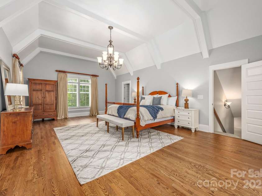 3201 Oak Brook Drive, Waxhaw, NC 28173.  MLS# CAR4247605, YatesRealty ID 25490. Luxurious Primary Suite that features a beautiful ceiling detail