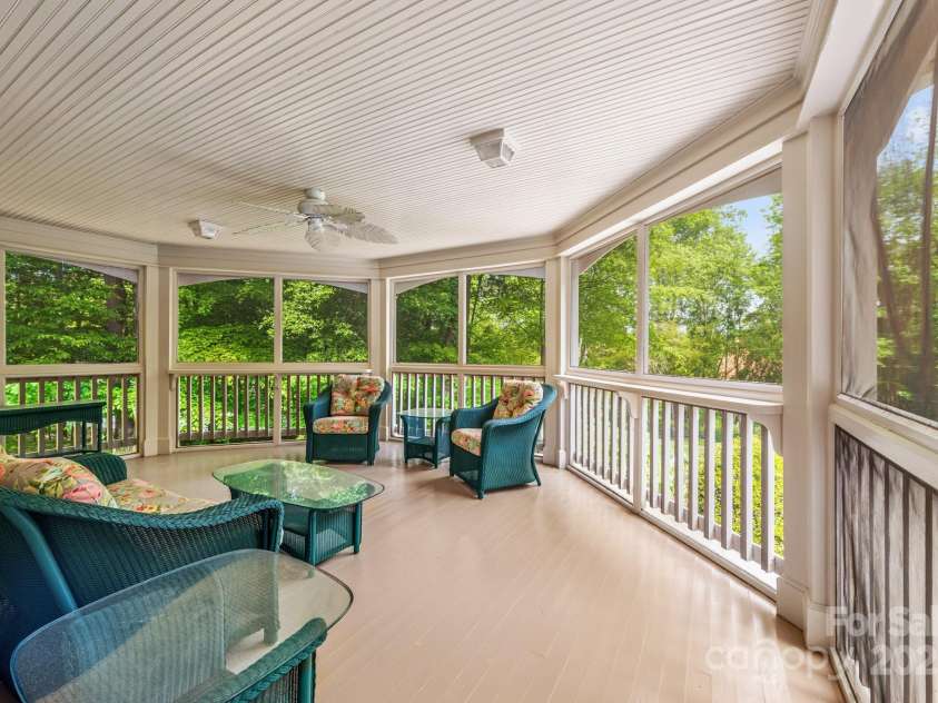 3201 Oak Brook Drive, Waxhaw, NC 28173.  MLS# CAR4247605, YatesRealty ID 25490. Spacious Screened Porch overlooking the pool