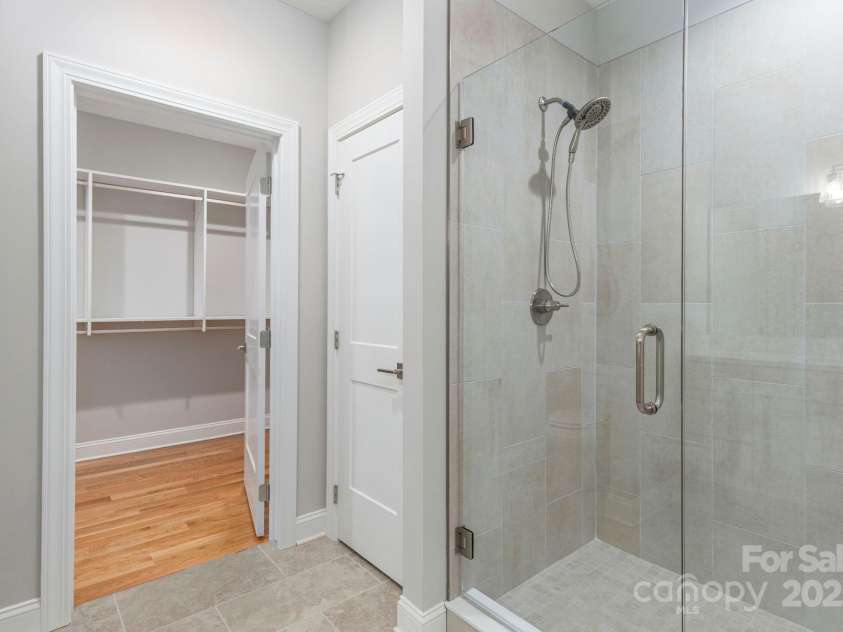 54 Herron View Lane, Weaverville, NC 28787.  MLS# CAR4225243, YatesRealty ID 25495. And a beautifully tiled walk-in shower