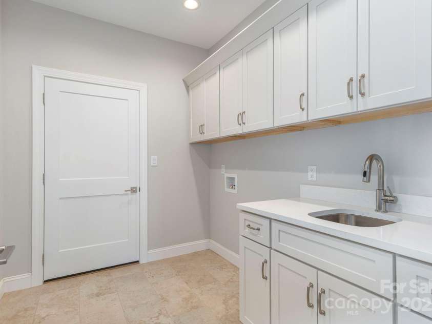54 Herron View Lane, Weaverville, NC 28787.  MLS# CAR4225243, YatesRealty ID 25495. Your new laundry room on the main level