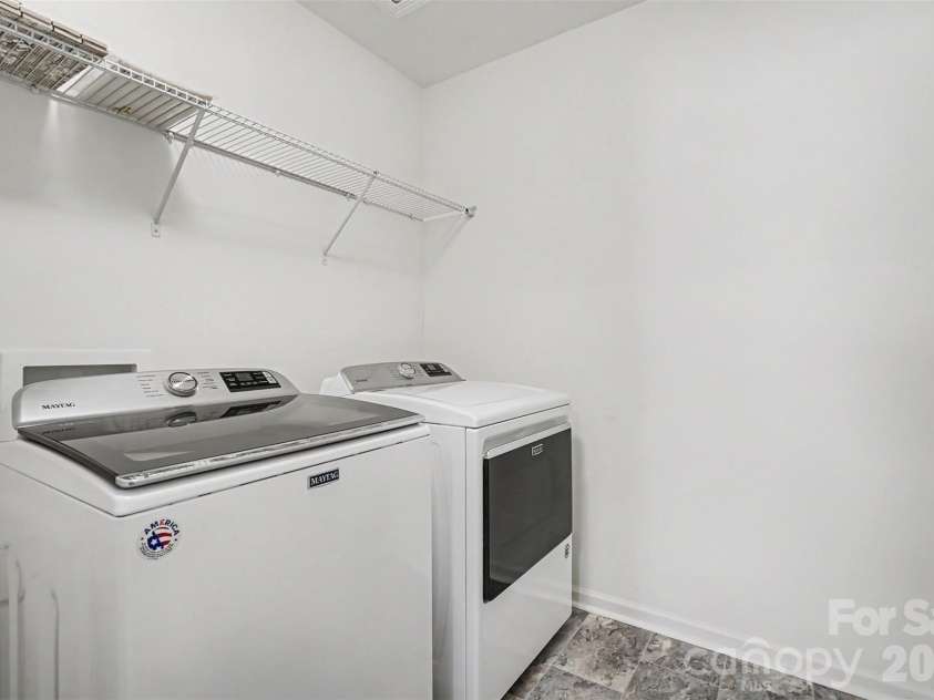 146 Fairfield Drive, Troutman, NC 28166.  MLS# CAR4386518, YatesRealty ID 25497. Upstairs laundry room