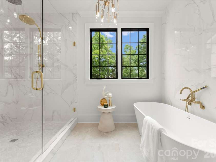 4142 Pineview Road, Charlotte, NC 28211.  MLS# CAR4384972, YatesRealty ID 25498. Frameless shower, tiled floors