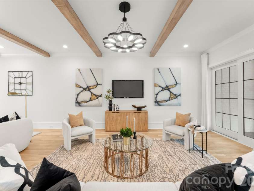 4142 Pineview Road, Charlotte, NC 28211.  MLS# CAR4384972, YatesRealty ID 25498. Gathering room with fireplace
