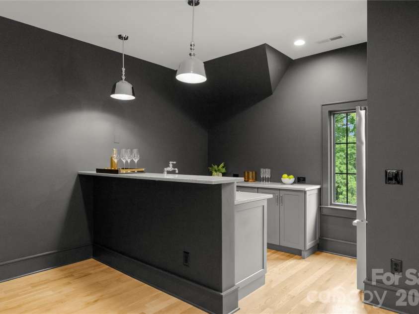 4142 Pineview Road, Charlotte, NC 28211.  MLS# CAR4384972, YatesRealty ID 25498. Wet bar & refrigerator  for easy entertaining