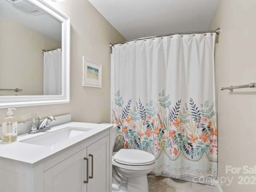 17 Sweetwater Oaks Drive, Fletcher, NC 28732.  MLS# CAR4233584, YatesRealty ID 2550. Bathroom in Basement