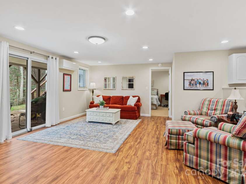 17 Sweetwater Oaks Drive, Fletcher, NC 28732.  MLS# CAR4233584, YatesRealty ID 2550. Family Room in Basement
