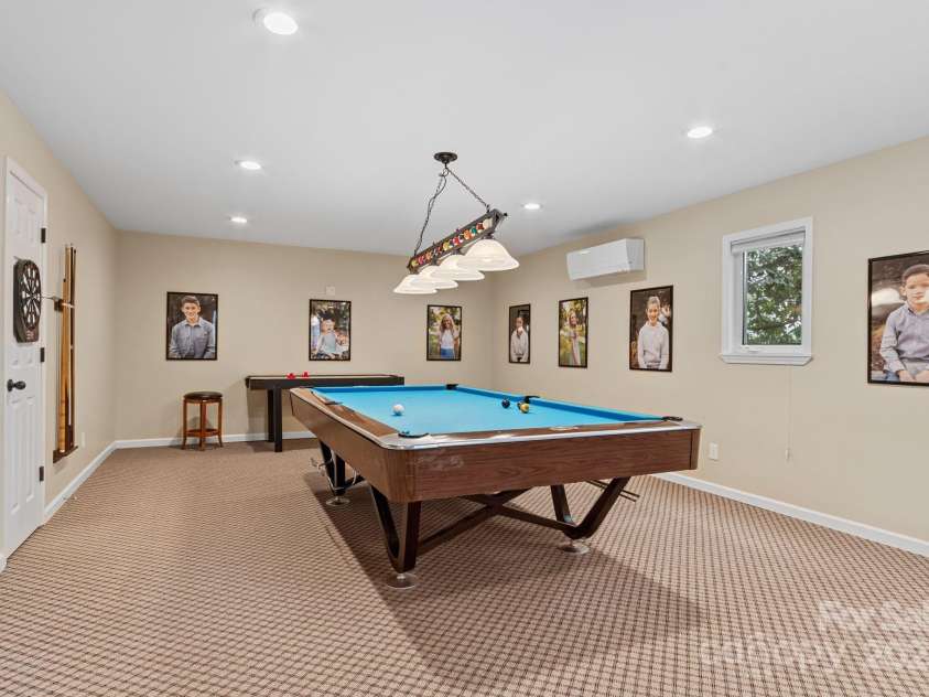 17 Sweetwater Oaks Drive, Fletcher, NC 28732.  MLS# CAR4233584, YatesRealty ID 2550. Game room in Basement