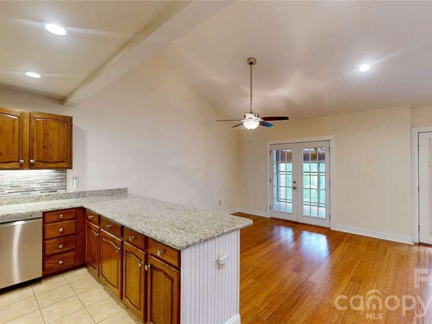 103 Woodfield Drive, Asheville, NC 28803.  MLS# CAR4386068, YatesRealty ID 25513. Dining room and kitchen
