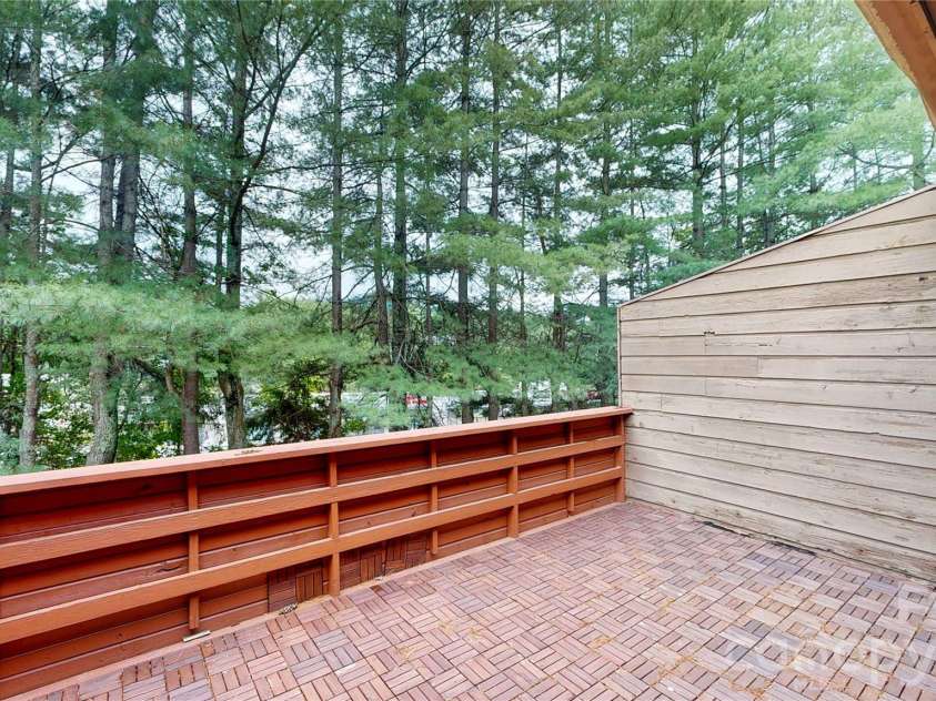 103 Woodfield Drive, Asheville, NC 28803.  MLS# CAR4386068, YatesRealty ID 25513. Good-sized deck with IKEA flooring