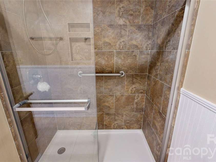 103 Woodfield Drive, Asheville, NC 28803.  MLS# CAR4386068, YatesRealty ID 25513. Shower for hall bath