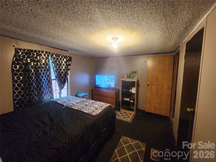 135 Watson Avenue, Taylorsville, NC 28681.  MLS# CAR4385502, YatesRealty ID 25516. 