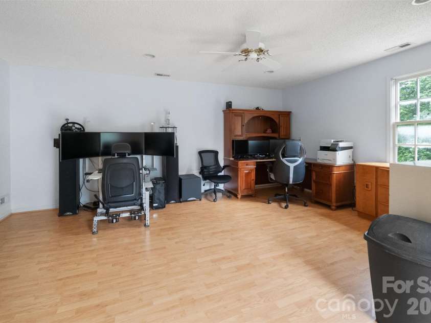 229 Oakridge Road, Stanley, NC 28164.  MLS# CAR4386671, YatesRealty ID 25518. Office over garage