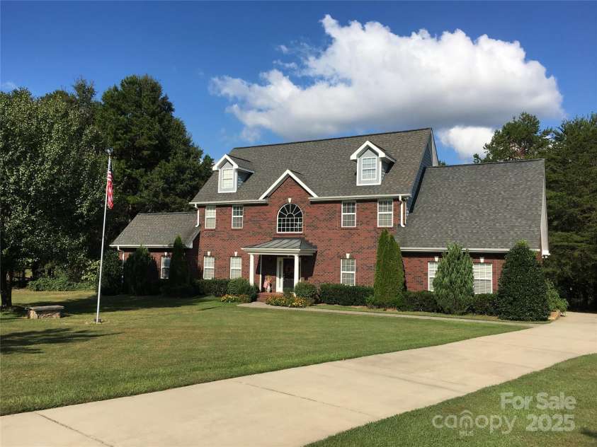 14124 Hiwassee Road, Huntersville, NC 28078.  MLS# CAR4240822, YatesRealty ID 25521. Front of Home