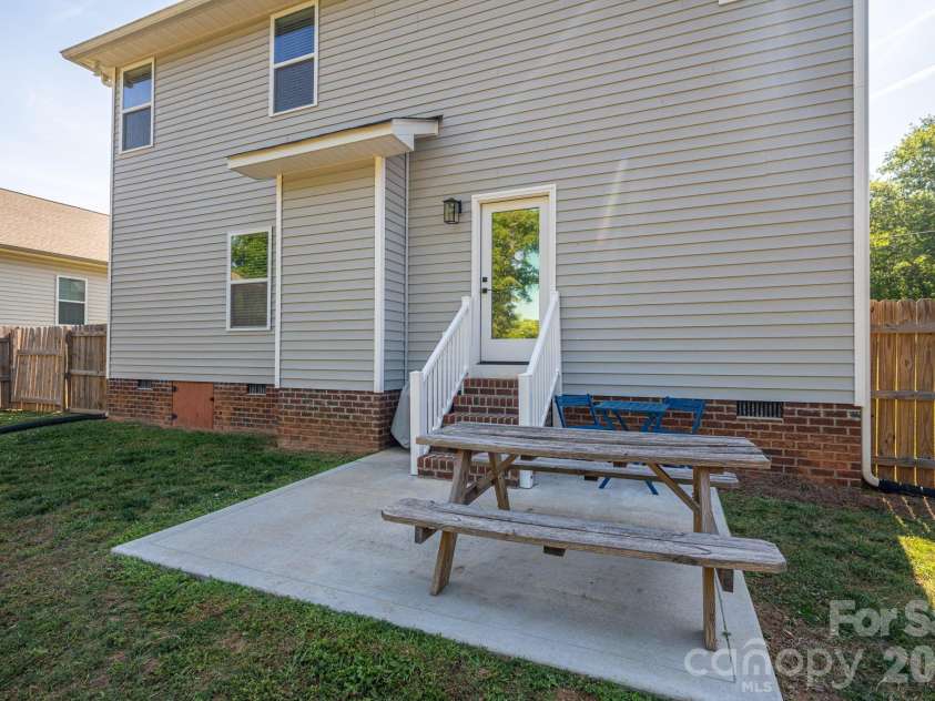 107 Hillcrest Street, Shelby, NC 28152.  MLS# CAR4378081, YatesRealty ID 25522. Back patio