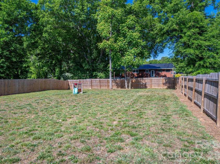 107 Hillcrest Street, Shelby, NC 28152.  MLS# CAR4378081, YatesRealty ID 25522. Completely fenced backyard