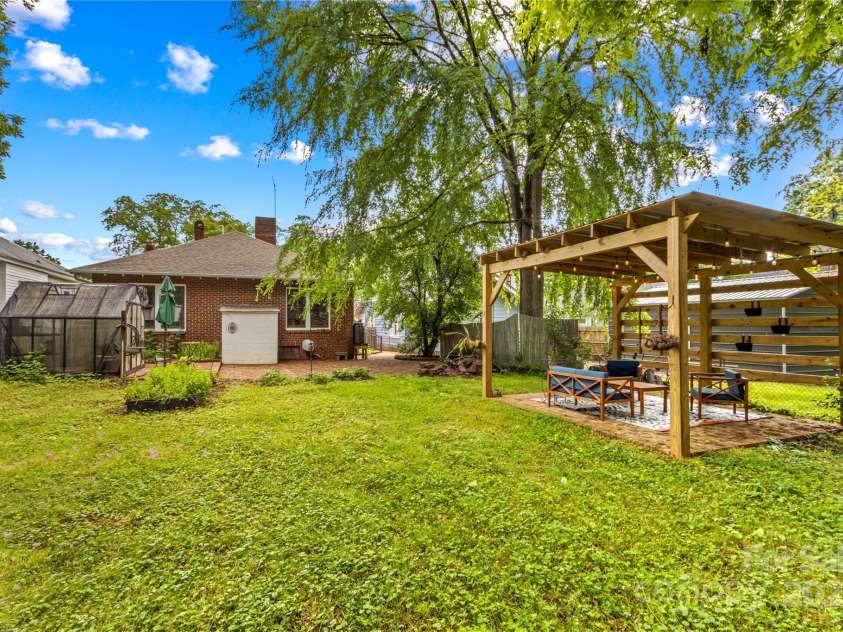 119 Wiley Avenue, Salisbury, NC 28144.  MLS# CAR4250756, YatesRealty ID 25522. Back yard with pergola