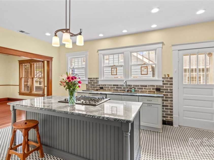 119 Wiley Avenue, Salisbury, NC 28144.  MLS# CAR4250756, YatesRealty ID 25522. Kitchen sink view with custom brick backsplash