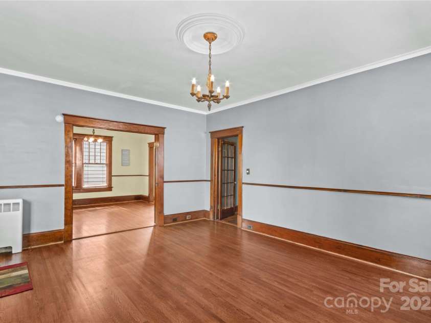 119 Wiley Avenue, Salisbury, NC 28144.  MLS# CAR4250756, YatesRealty ID 25522. Living room looking toward dining room