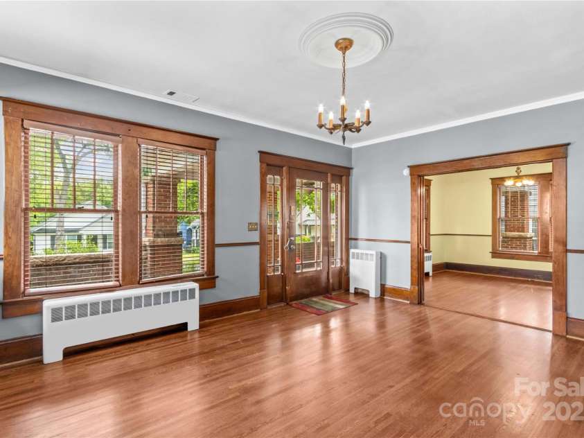 119 Wiley Avenue, Salisbury, NC 28144.  MLS# CAR4250756, YatesRealty ID 25522. Living room looking toward front door