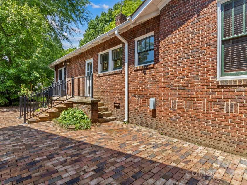 119 Wiley Avenue, Salisbury, NC 28144.  MLS# CAR4250756, YatesRealty ID 25522. Side entrance to a private patio with handmade bricks