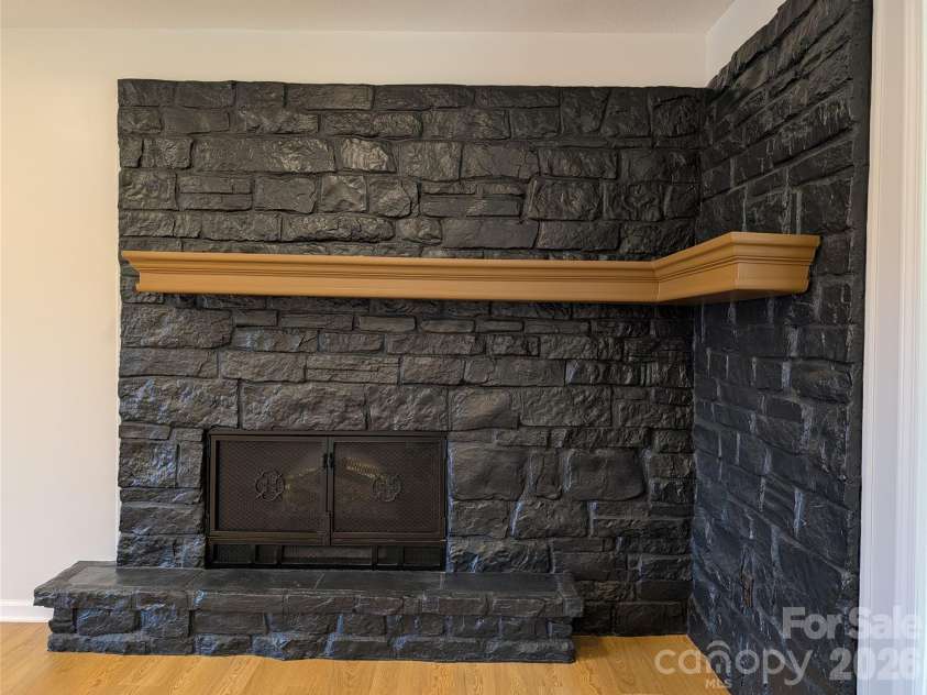 945 Summers Road, Valdese, NC 28690.  MLS# CAR4362217, YatesRealty ID 25523. Fireplace with electric insert