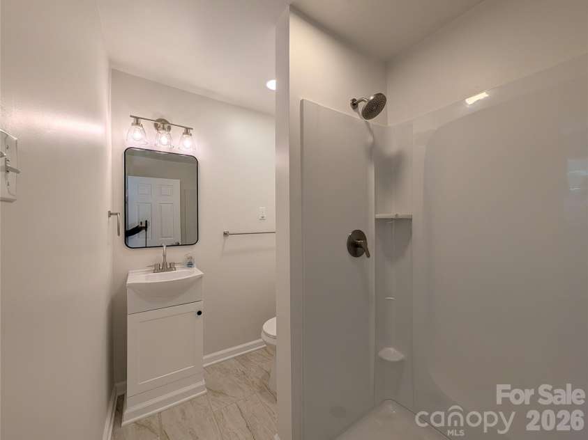945 Summers Road, Valdese, NC 28690.  MLS# CAR4362217, YatesRealty ID 25523. Primary bathroom