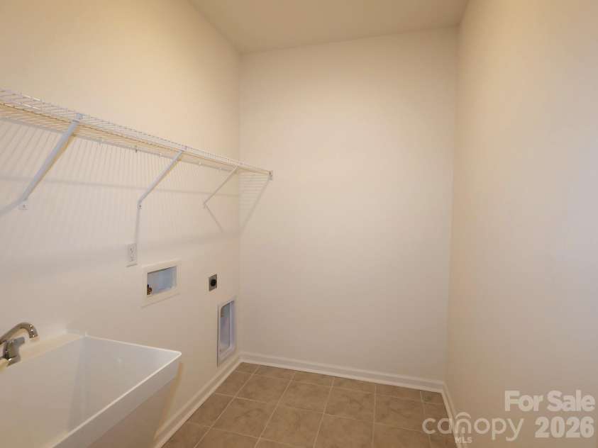 634 Downshire Road, Concord, NC 28027.  MLS# CAR4363232, YatesRealty ID 25524. Laundry room