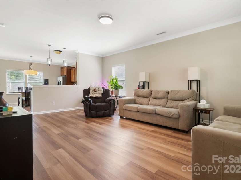 1628 Fitchburg Court, Charlotte, NC 28214.  MLS# CAR4276225, YatesRealty ID 25525. Large family room for entertaining and gathering!