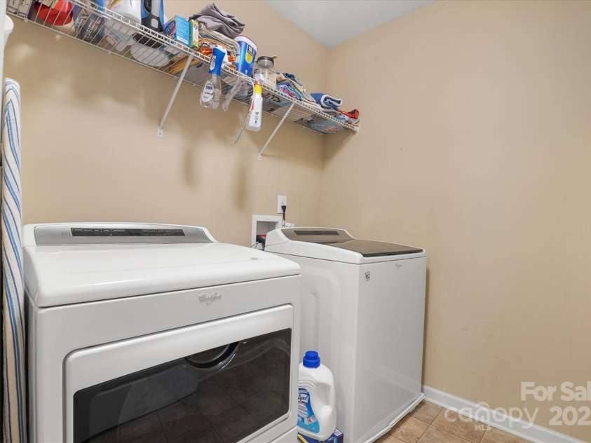 1628 Fitchburg Court, Charlotte, NC 28214.  MLS# CAR4276225, YatesRealty ID 25525. Large laundry room!