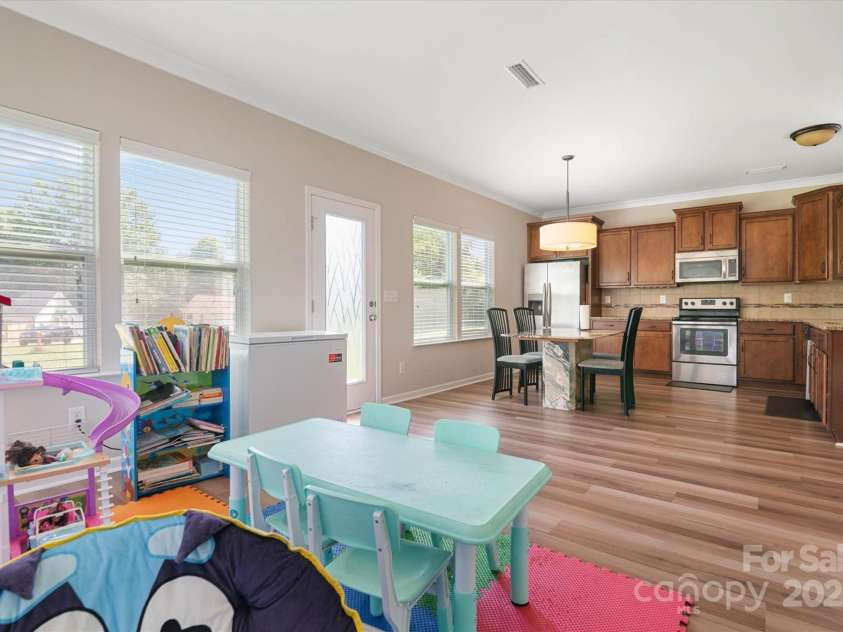 1628 Fitchburg Court, Charlotte, NC 28214.  MLS# CAR4276225, YatesRealty ID 25525. Sun room area!!!