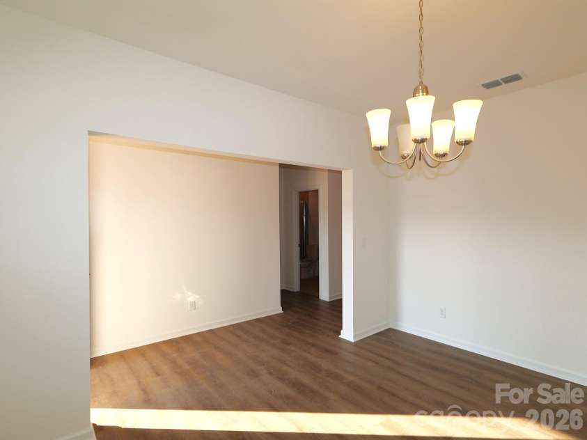 233 Amber Glen Drive, Locust, NC 28097.  MLS# CAR4384629, YatesRealty ID 25526. Dining room