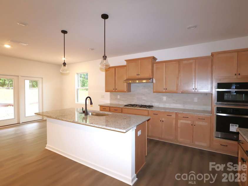 233 Amber Glen Drive, Locust, NC 28097.  MLS# CAR4384629, YatesRealty ID 25526. Kitchen