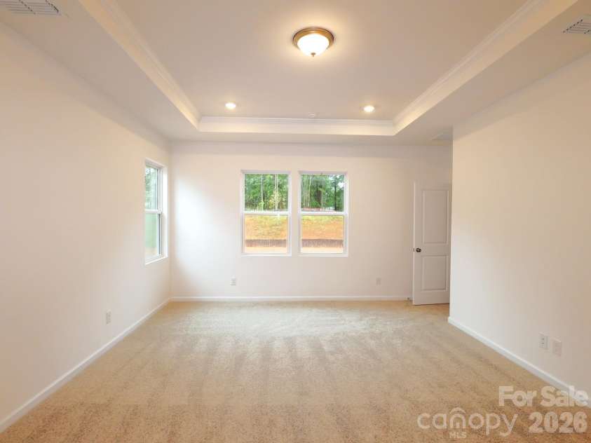 233 Amber Glen Drive, Locust, NC 28097.  MLS# CAR4384629, YatesRealty ID 25526. Owner's suite