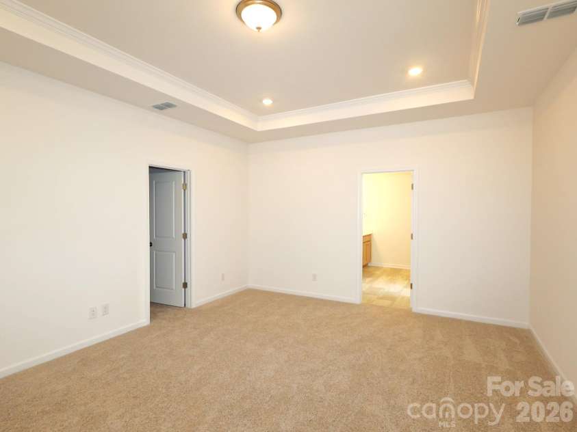 233 Amber Glen Drive, Locust, NC 28097.  MLS# CAR4384629, YatesRealty ID 25526. Owner's suite