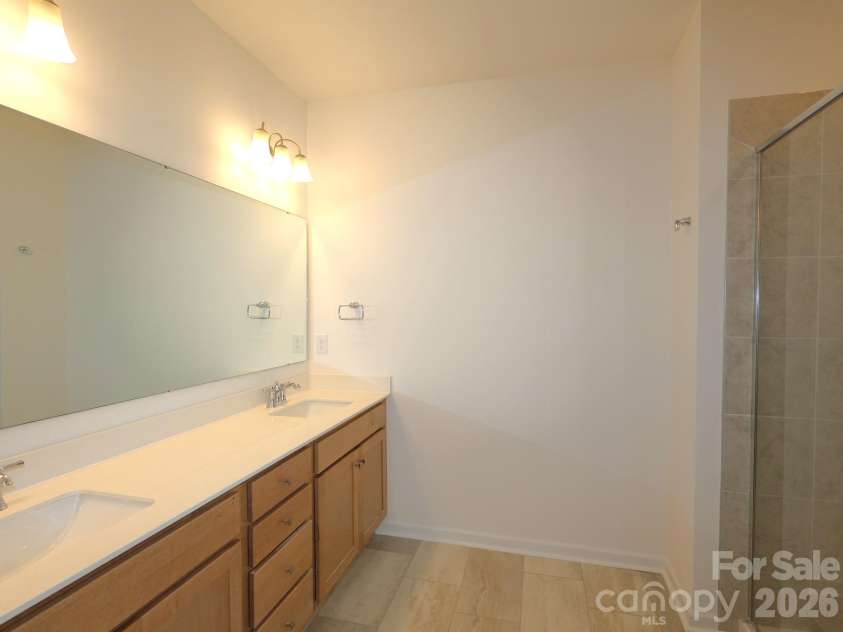 233 Amber Glen Drive, Locust, NC 28097.  MLS# CAR4384629, YatesRealty ID 25526. Owner's suite