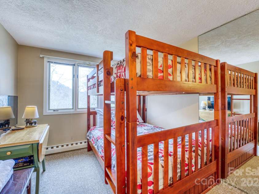 1443 Sugar Mountain Drive, Sugar Mountain, NC 28604.  MLS# CAR4122060, YatesRealty ID 2553. Bunkroom on main floor