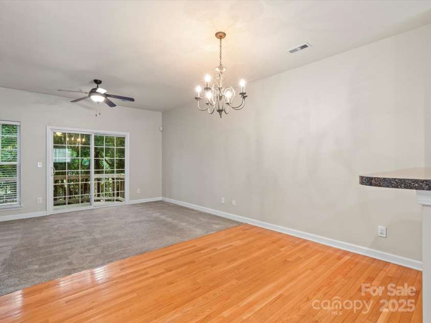 6411 Royal Celadon Way, Charlotte, NC 28269.  MLS# CAR4278630, YatesRealty ID 25530. Hardwood flooring in dining area