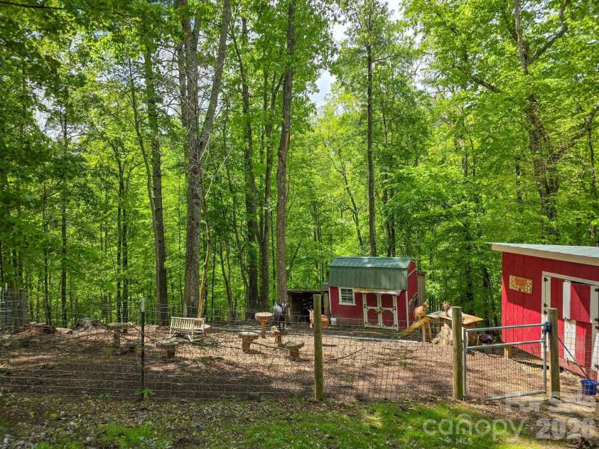 360 Shadow Lane, Green Mountain, NC 28740.  MLS# CAR4381079, YatesRealty ID 25534. Goat enclosures and barns