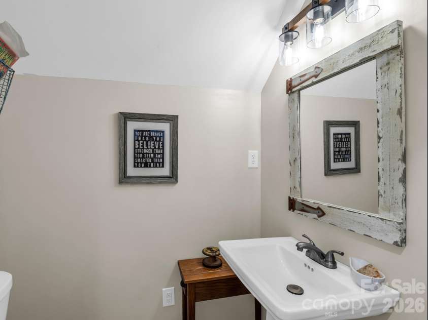 360 Shadow Lane, Green Mountain, NC 28740.  MLS# CAR4381079, YatesRealty ID 25534. Half bathroom in gym