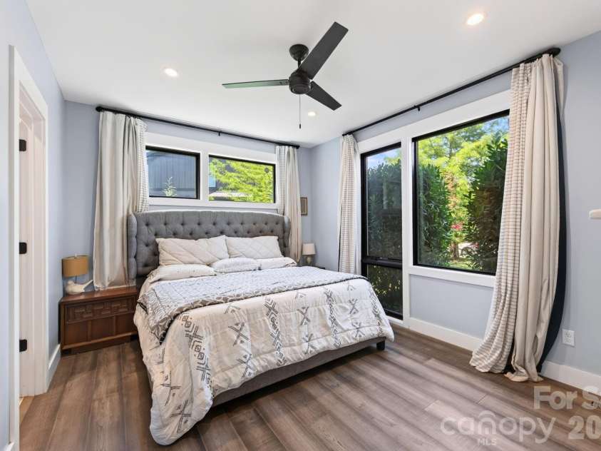 40 Malvern Walk, Asheville, NC 28806.  MLS# CAR4419917, YatesRealty ID 25535. Lux Primary Suite Features a Clerestory Window and HydroBlok Hickory Flooring
