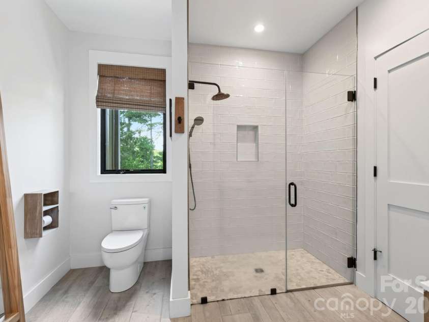 40 Malvern Walk, Asheville, NC 28806.  MLS# CAR4419917, YatesRealty ID 25535. Zero-Step Entry Tiled Shower and Water Closet Nook