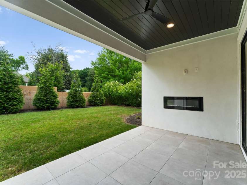 3308 Carmel Road, Charlotte, NC 28226.  MLS# CAR4272208, YatesRealty ID 25542. Covered Porch with fireplace