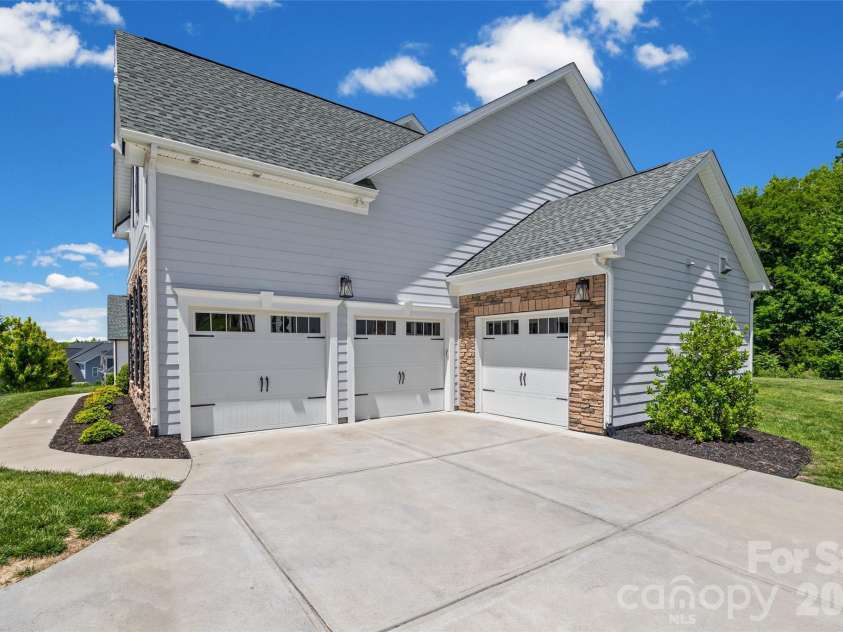 323 Forsythia Lane, Tega Cay, SC 29708.  MLS# CAR4377014, YatesRealty ID 25548. 3 car garage