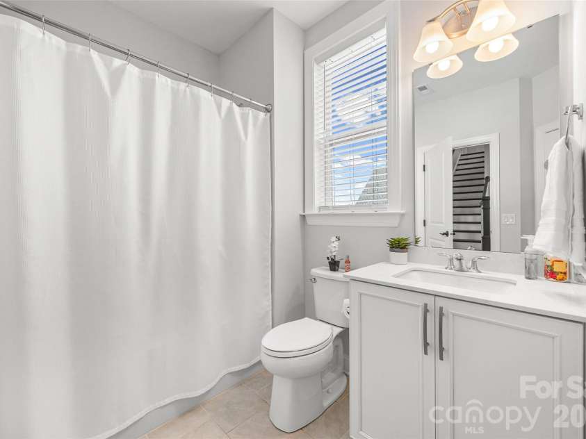 323 Forsythia Lane, Tega Cay, SC 29708.  MLS# CAR4377014, YatesRealty ID 25548. First floor full bathroom