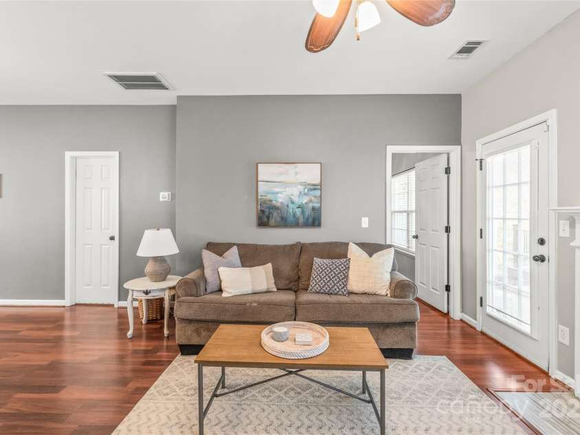 114 Clydesdale Court, Matthews, NC 28104.  MLS# CAR4234456, YatesRealty ID 2555. Enjoy the convenience of a first-floor bedroom just off the living room (door open).