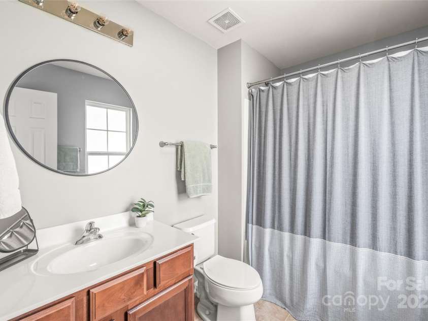 114 Clydesdale Court, Matthews, NC 28104.  MLS# CAR4234456, YatesRealty ID 2555. Relaxing Primary Bathroom!